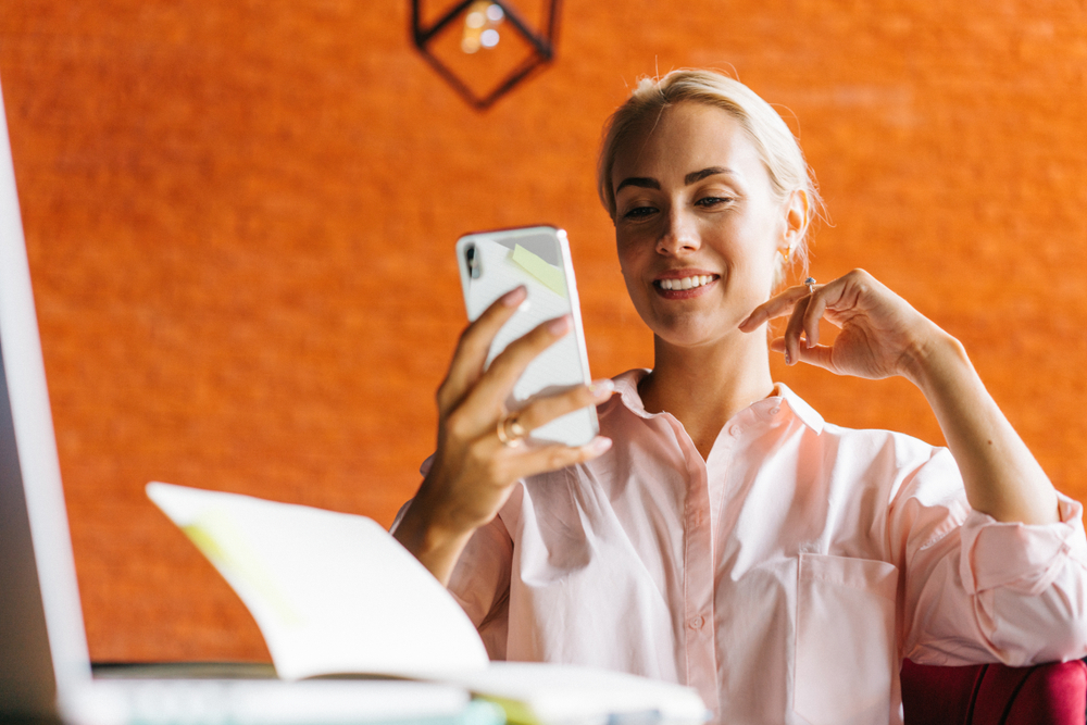 a professional woman on her phone